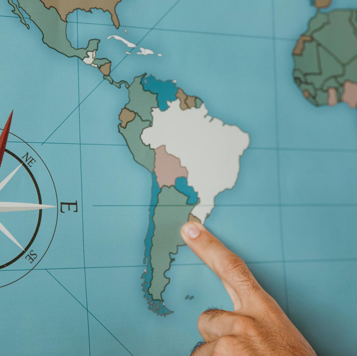 person-pointing-south-america-map.jpg